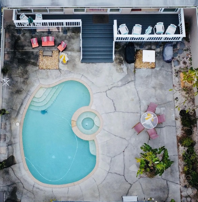 7941 Sycamore Dr, New Port Richey, FL 34654 - view of pool with a pool with connected hot tub and a patio area