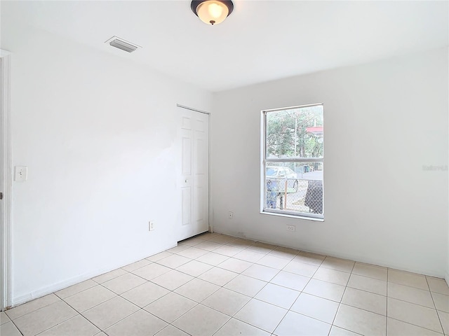 view of tiled empty room