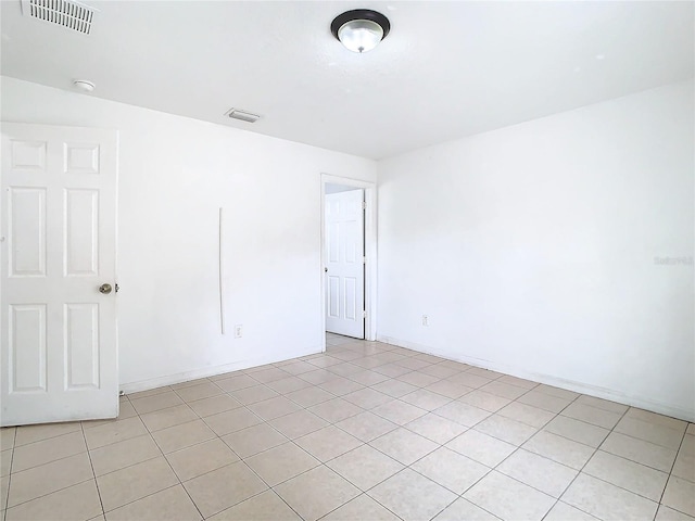 view of tiled spare room