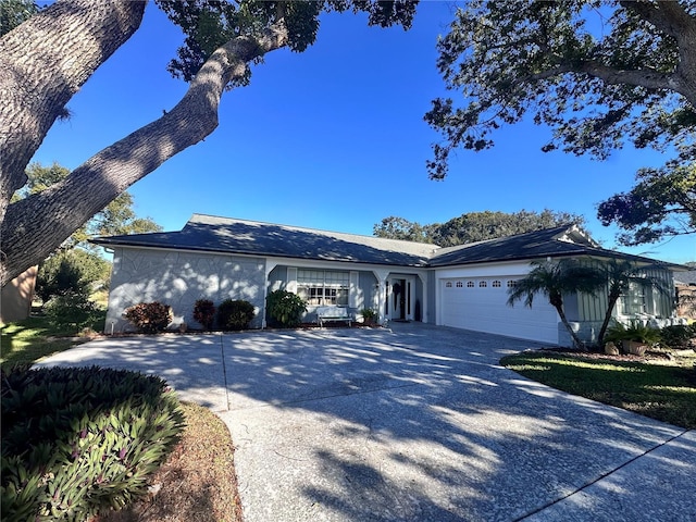 single story home with a garage