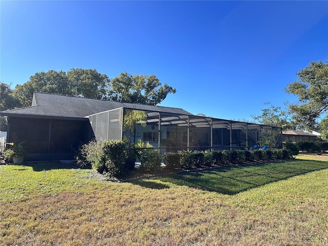 view of yard with a lanai