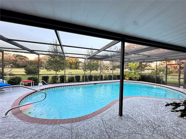 view of pool featuring a lanai and a patio