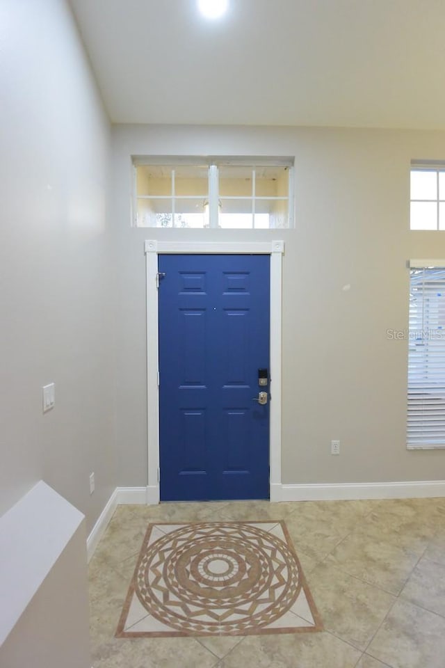 view of tiled foyer entrance