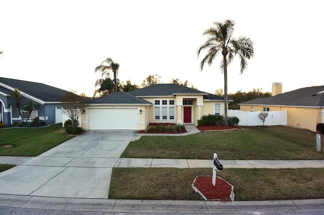 ranch-style house with a front yard and a garage