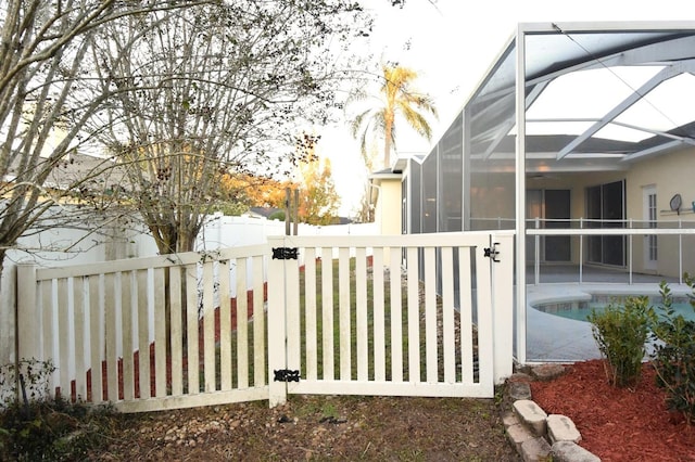 view of yard featuring a lanai and a patio area