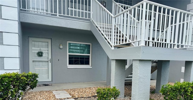 doorway to property featuring a balcony