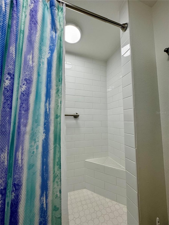 bathroom with walk in shower