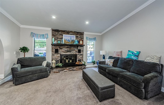 living room featuring a fireplace, carpet floors, and crown molding