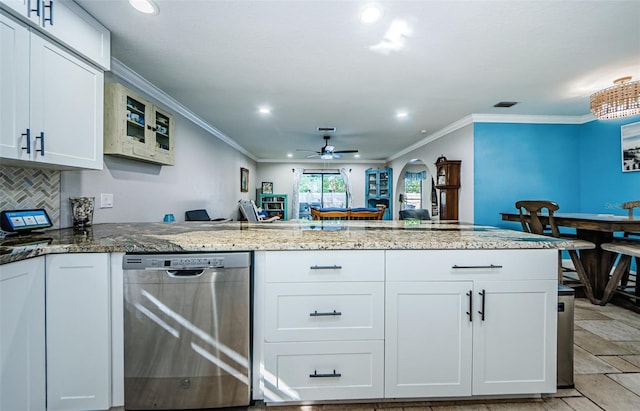 kitchen with white cabinets, dishwasher, kitchen peninsula, and stone counters