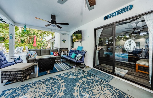 view of patio featuring outdoor lounge area and ceiling fan