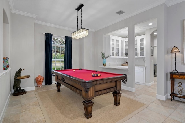 playroom featuring bar area, crown molding, light tile patterned floors, and billiards