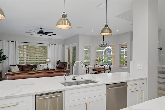 kitchen featuring dishwasher, pendant lighting, a healthy amount of sunlight, and sink