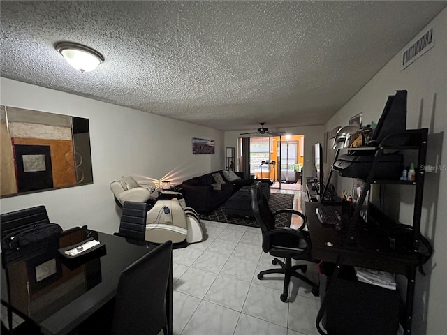 office space with ceiling fan, a textured ceiling, and french doors