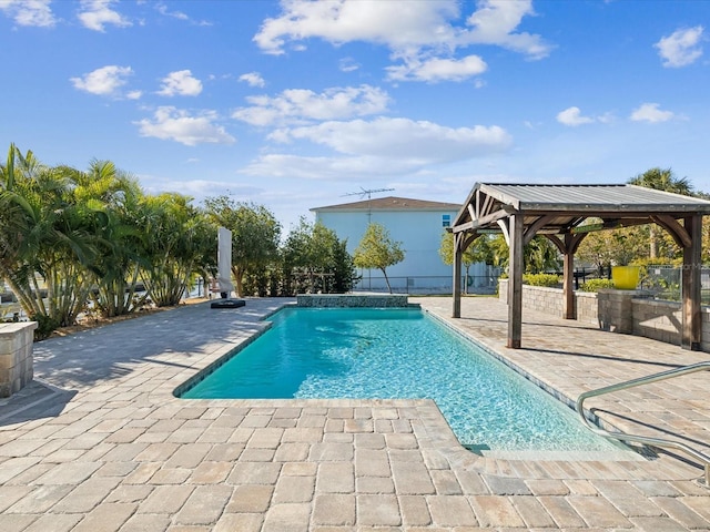 view of pool featuring a gazebo and a patio area