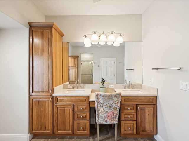 bathroom featuring vanity and a shower with door