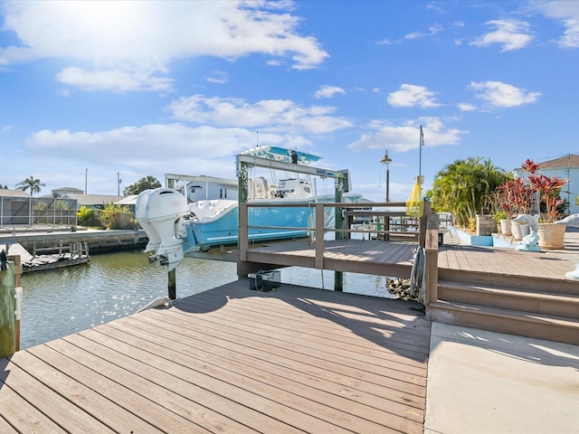 dock area with a water view