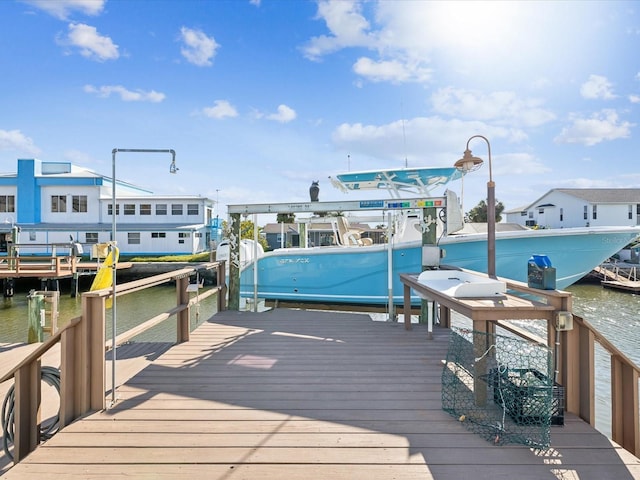 view of dock with a water view