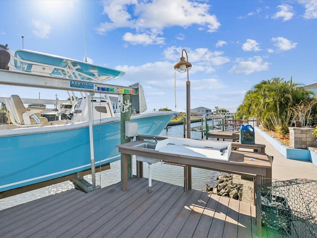 view of dock with a water view