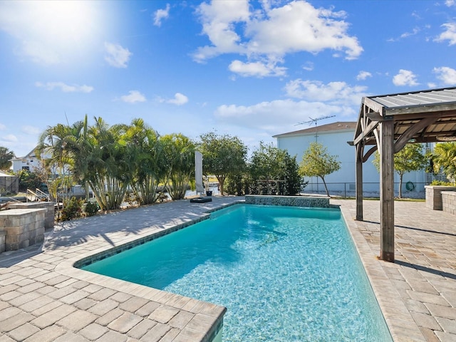 view of pool featuring a patio area