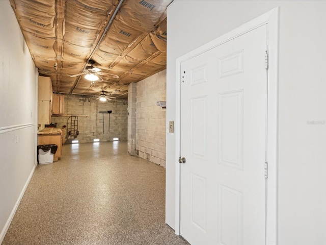 basement with ceiling fan