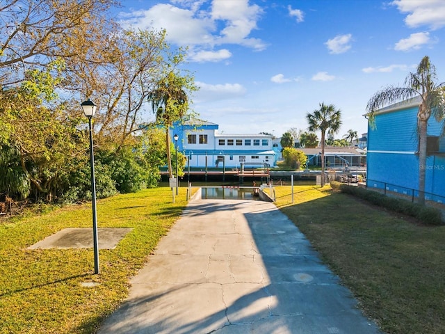 view of community with a yard