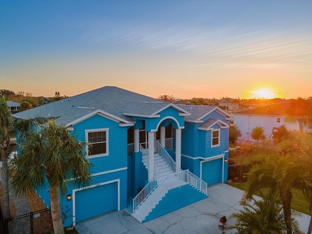 view of front of property with a garage