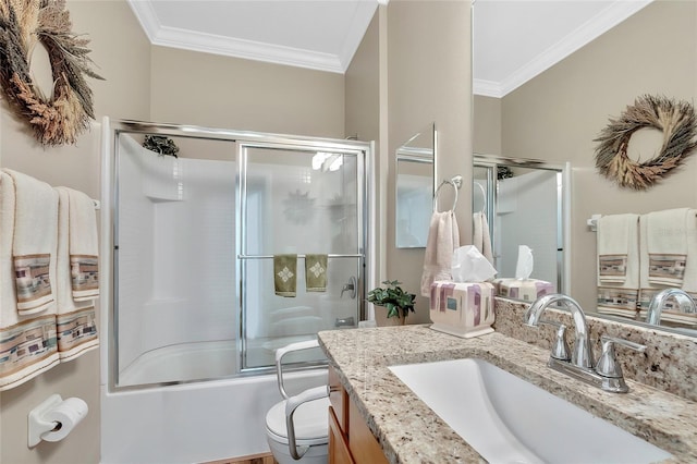 full bathroom with vanity, toilet, ornamental molding, and bath / shower combo with glass door