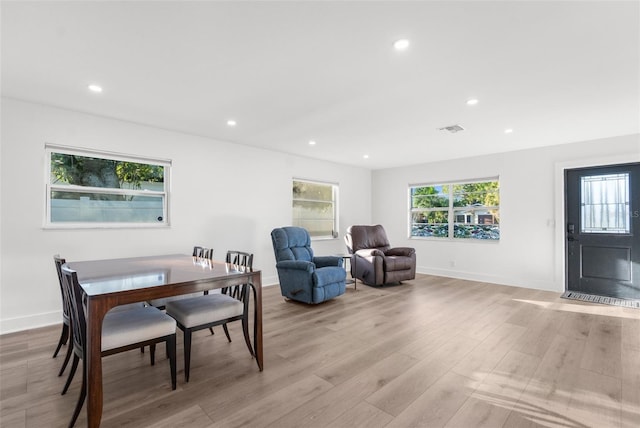 dining space featuring light hardwood / wood-style floors