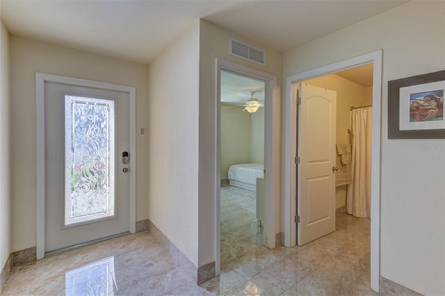 entrance foyer featuring a wealth of natural light