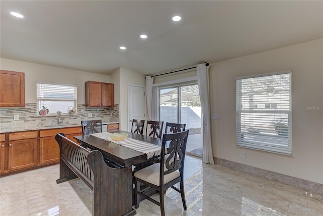 dining room featuring sink