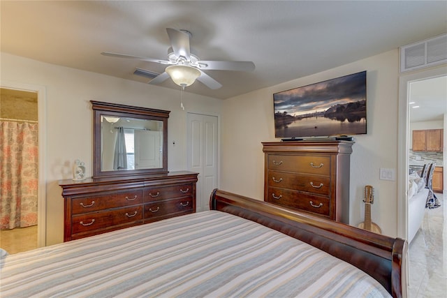 bedroom featuring ceiling fan and a closet