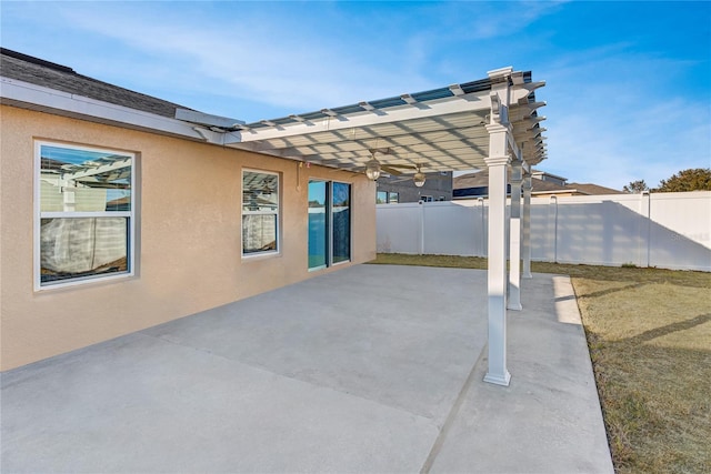 view of patio featuring a pergola