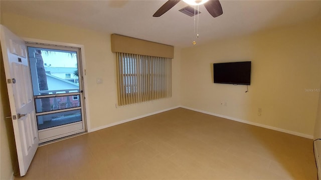 unfurnished room with ceiling fan