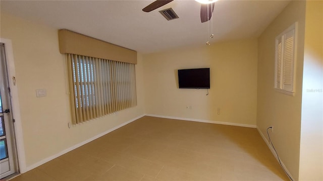 spare room featuring ceiling fan