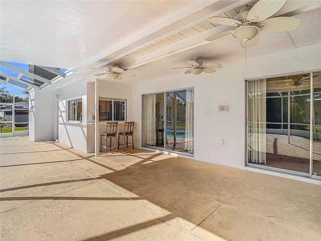 view of patio with a lanai