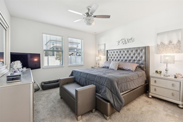 bedroom with light colored carpet and ceiling fan