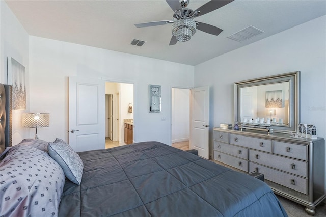 bedroom featuring ensuite bathroom and ceiling fan