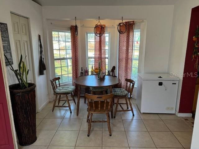 view of tiled dining space