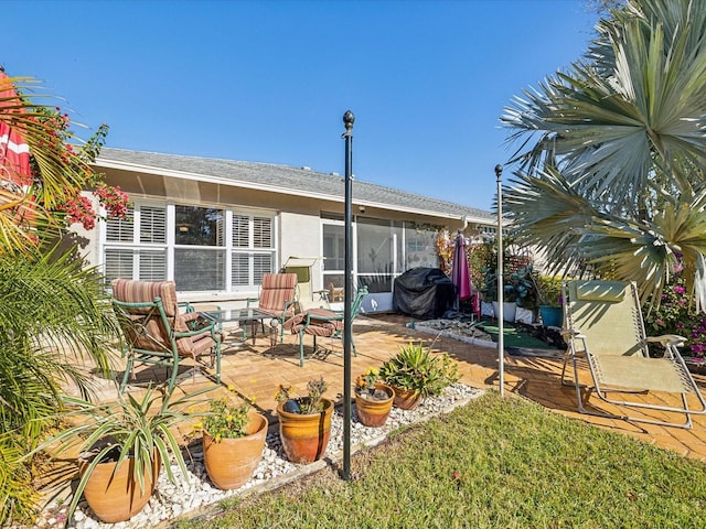 back of property with a patio area