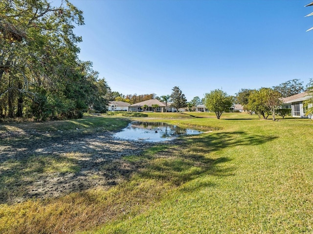 view of yard featuring a water view