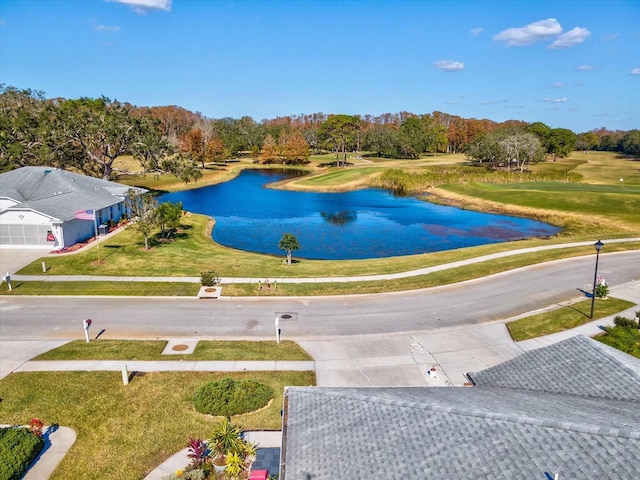 surrounding community featuring a water view