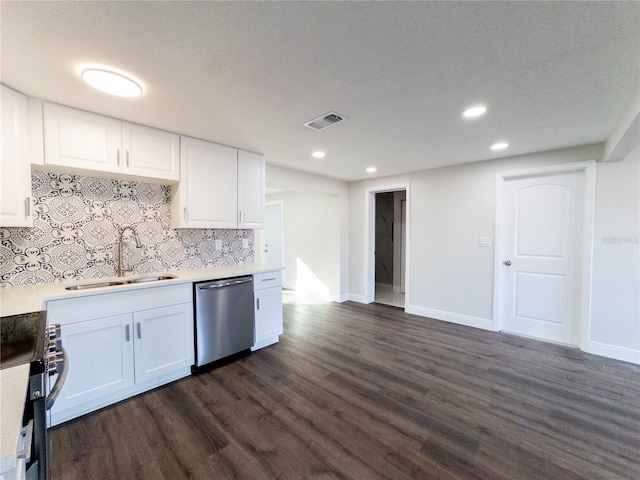 kitchen featuring dishwasher, dark hardwood / wood-style floors, white cabinetry, and sink