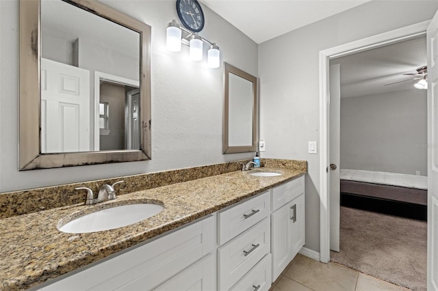 bathroom featuring vanity, tile patterned floors, and ceiling fan