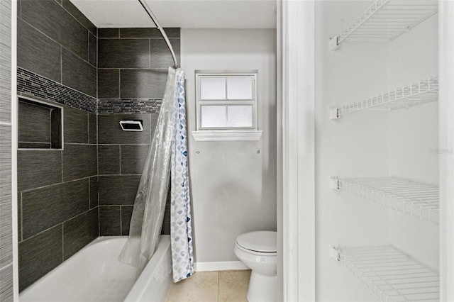 bathroom featuring toilet, shower / bath combination with curtain, and tile patterned floors