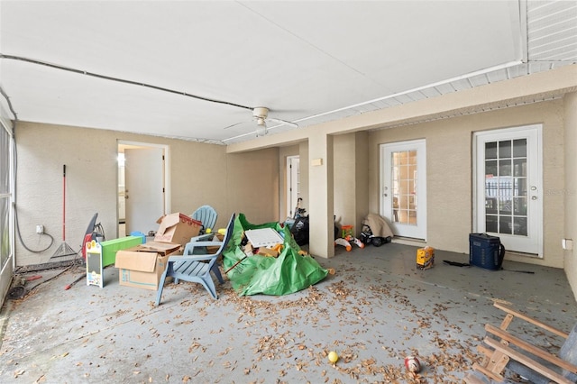 interior space featuring ceiling fan