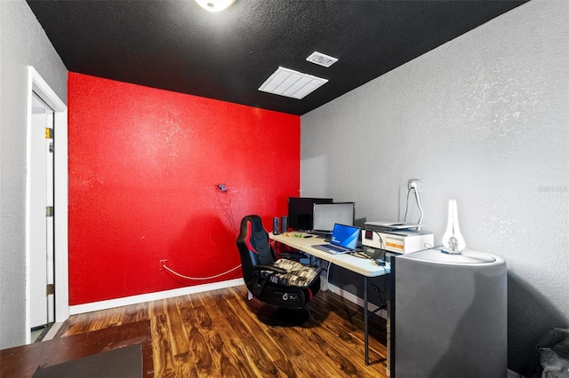 home office featuring dark hardwood / wood-style flooring