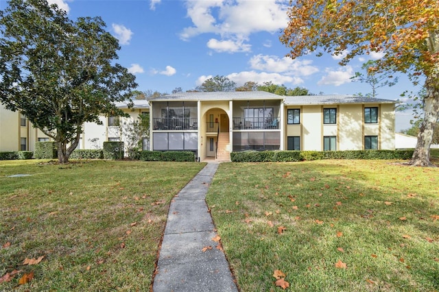 view of front facade with a front lawn