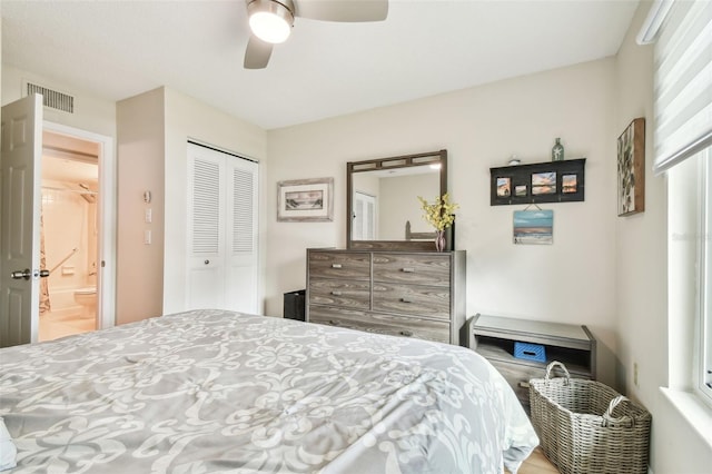 bedroom featuring ensuite bathroom, a closet, and ceiling fan