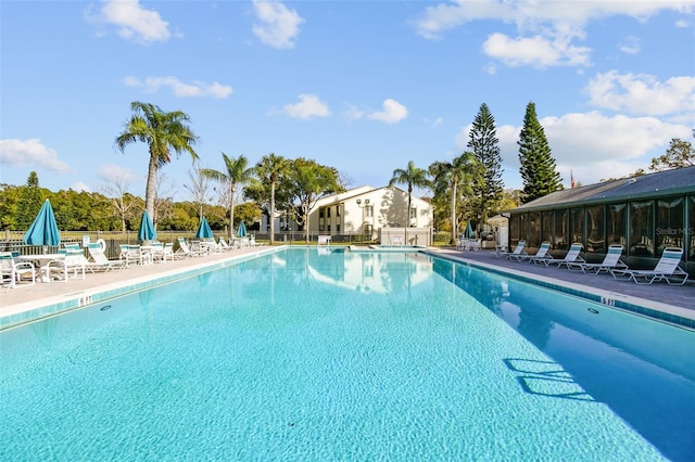 view of swimming pool with a patio area