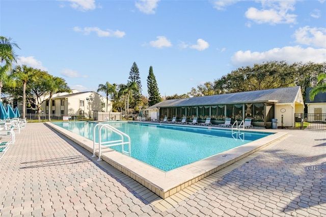 view of pool featuring a patio